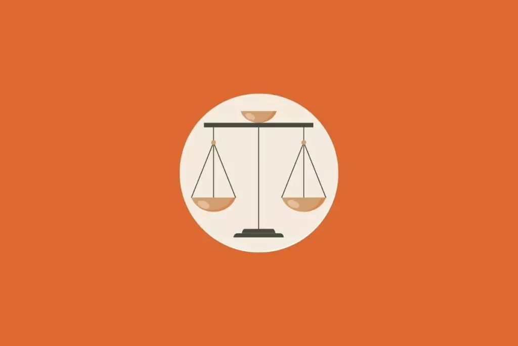 Ilustração de uma balança em um fundo laranja