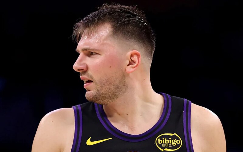 LOS ANGELES, CALIFORNIA - JANUARY 02: Luka Doncic #77 of the Los Angeles Lakers reacts after a play during the first quarter against the Memphis Grizzlies at Crypto.com Arena on January 02, 2026 in Los Angeles, California. NOTE TO USER: User expressly acknowledges and agrees that, by downloading and or using this photograph, User is consenting to the terms and conditions of the Getty Images License Agreement. (Photo by Katelyn Mulcahy/Getty Images)